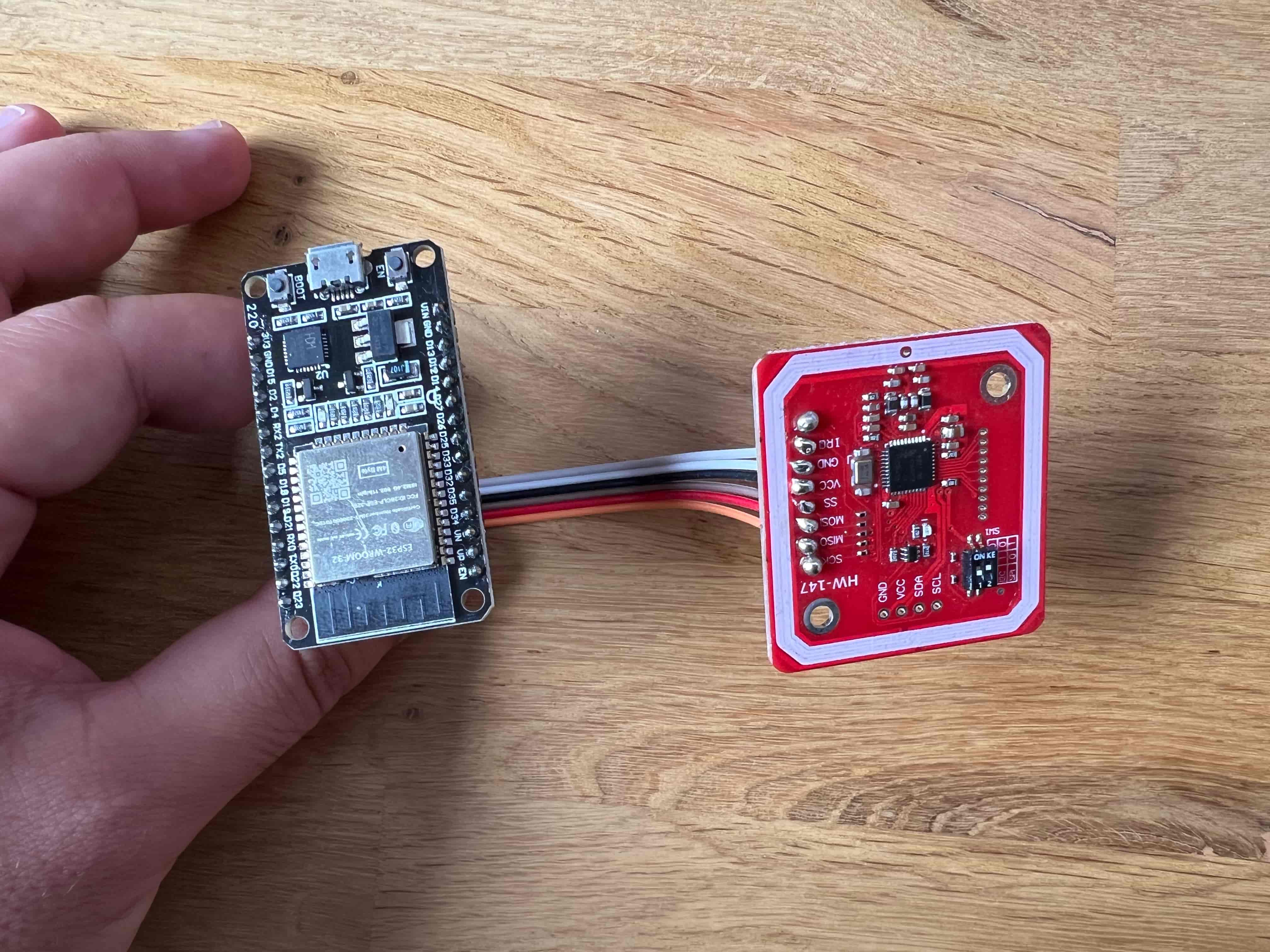 ESP32 connected to a PN532 NFC module for the Apple HomeKey entry system